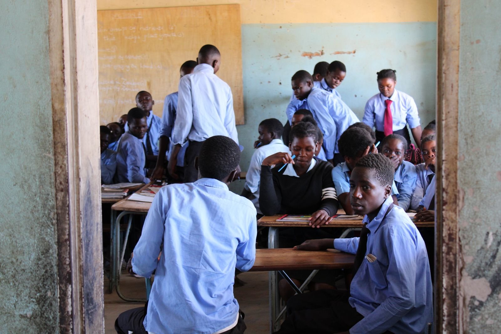 A classroom of pupils working at their desks